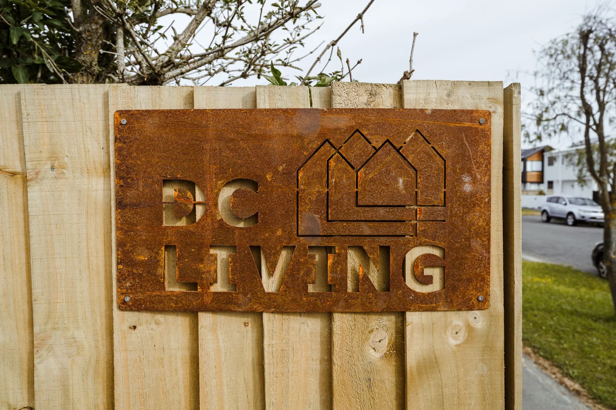 DC Living — corten steel site sign