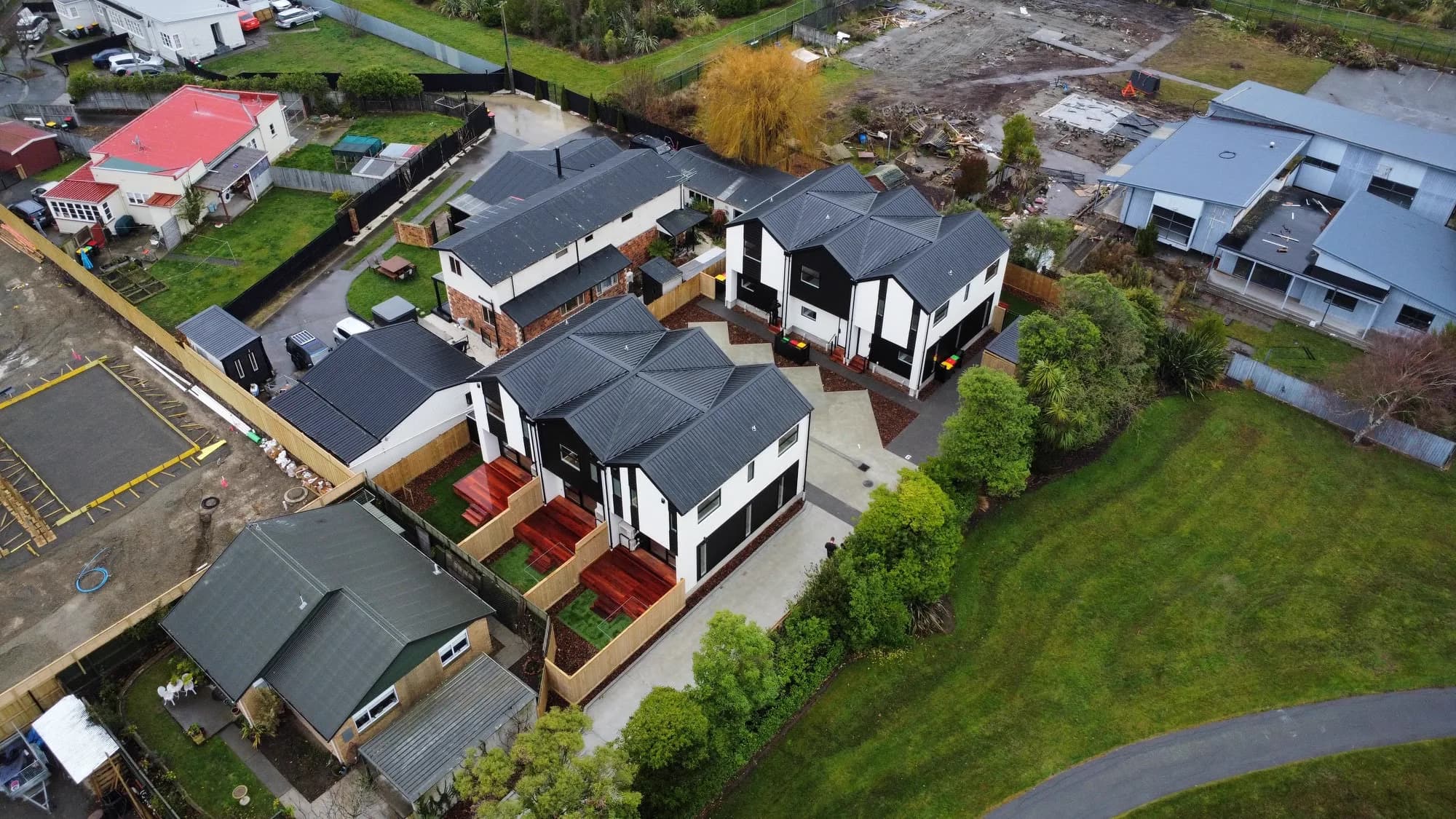 16 Smith Street — aerial view of black and white townhouses