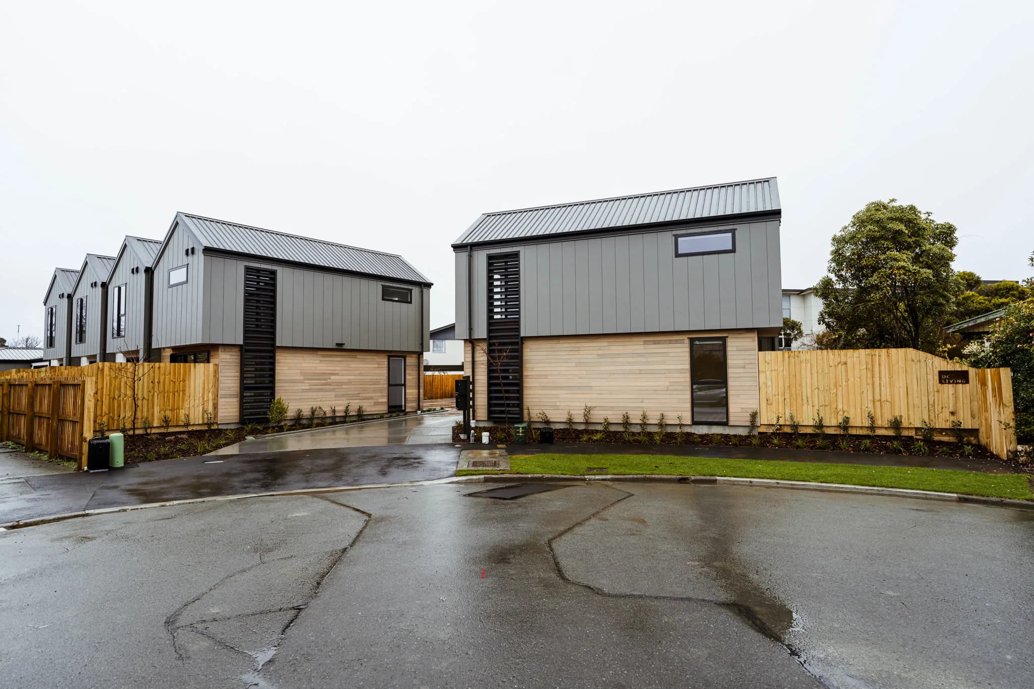 Trist Place — grey and cedar cladding exterior